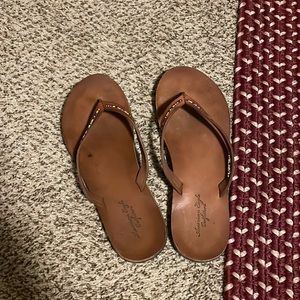 AE brown flip flops